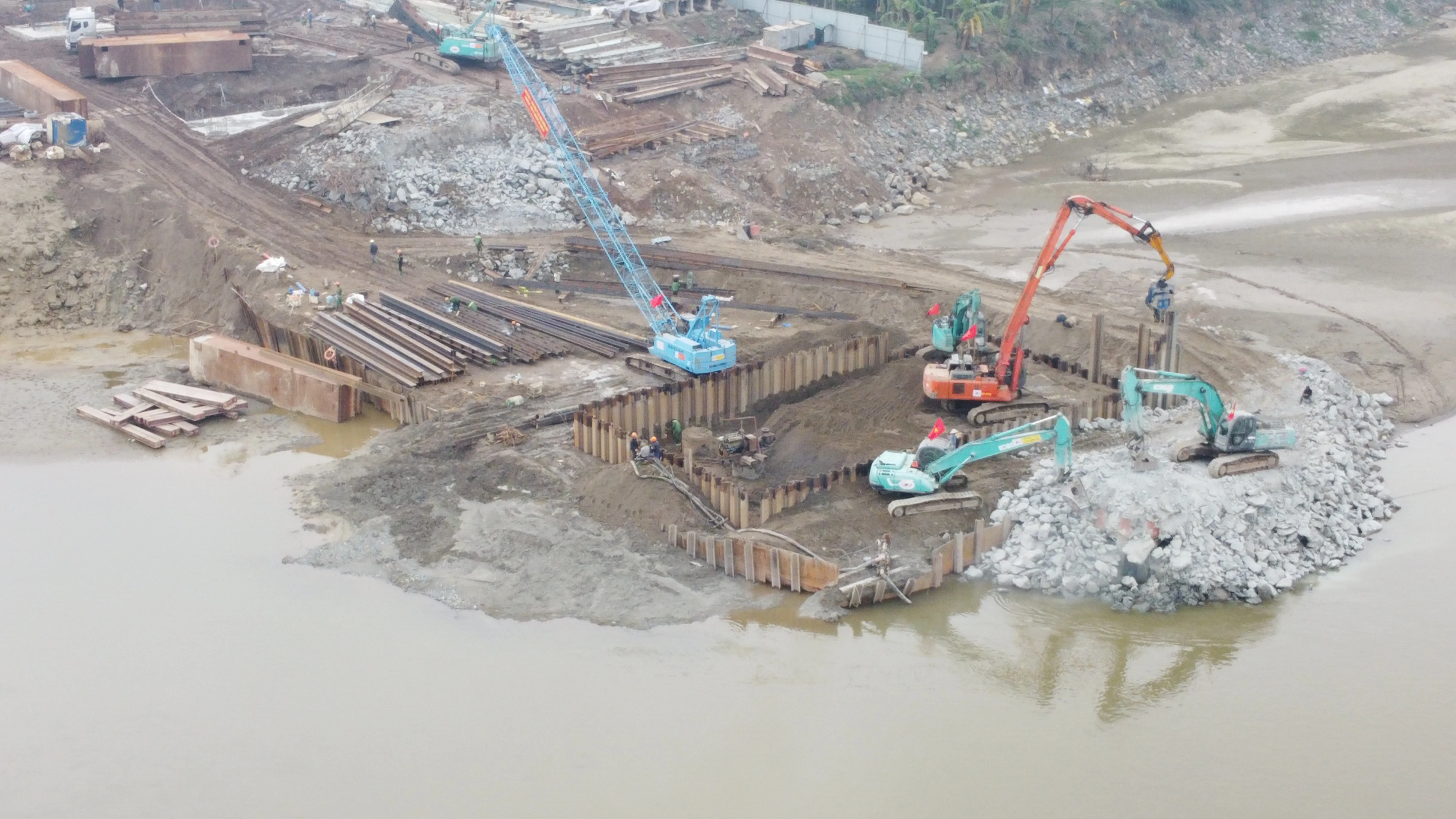 At the Construction Site of the New Phong Chau Bridge