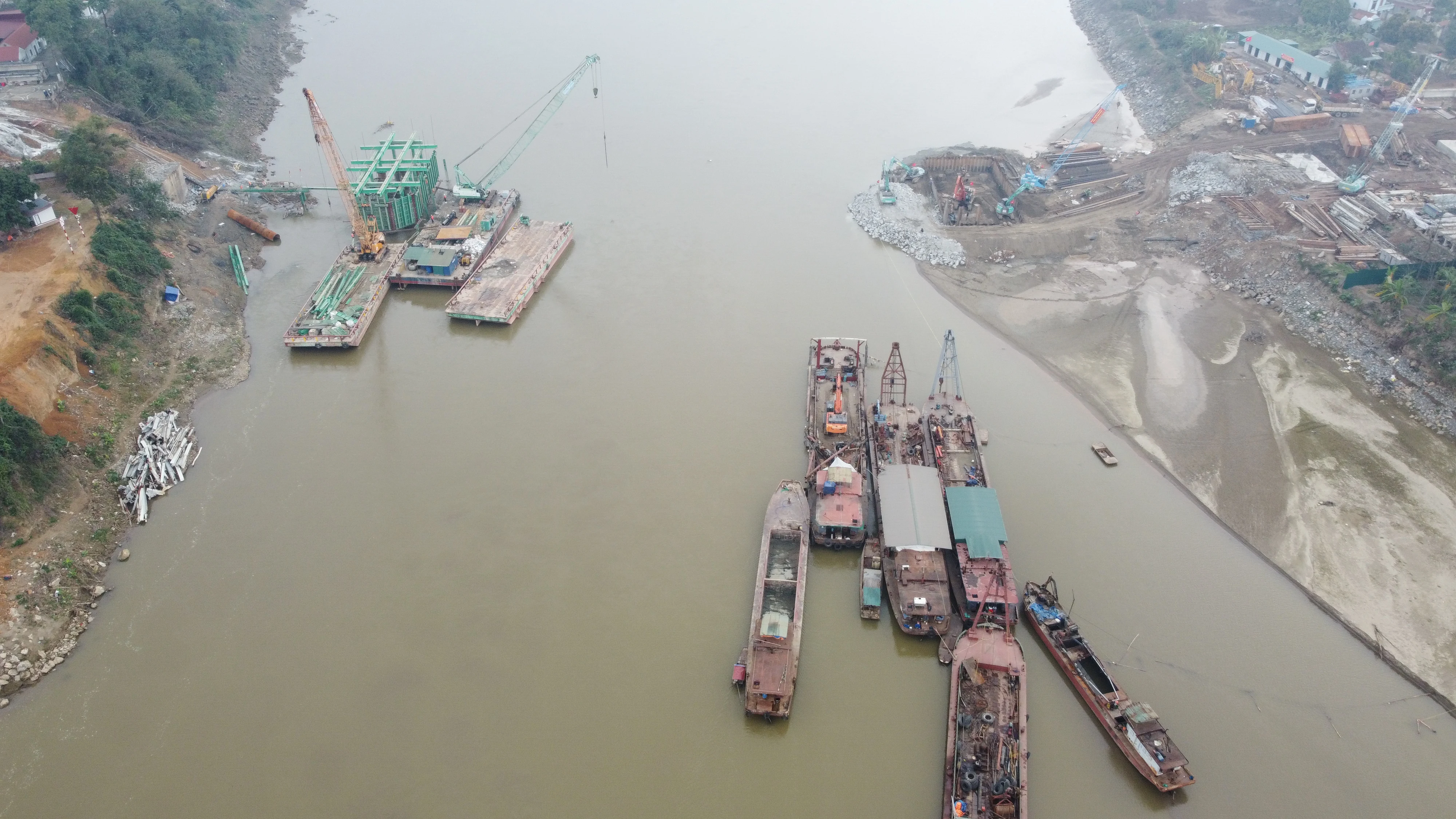 At the Construction Site of the New Phong Chau Bridge