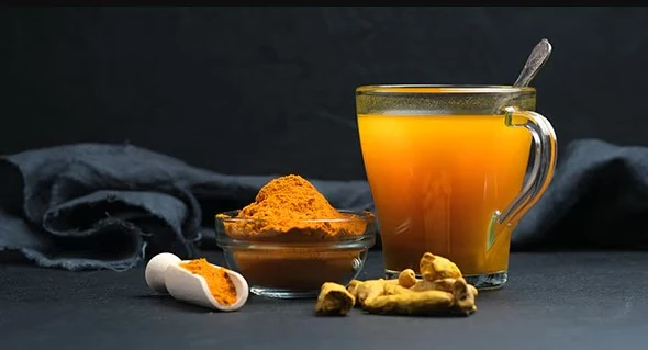 Những lợi ích khi uống nước ép nghệ và cà rốt