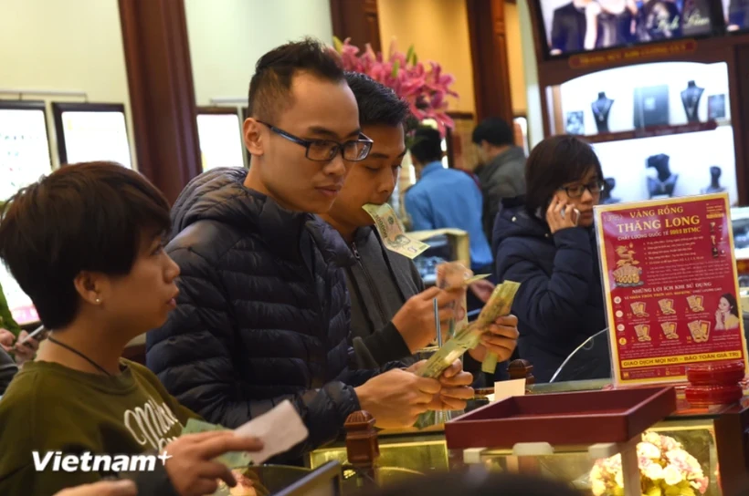 Giá vàng trong nước bật tăng lên trên 103 triệu đồng, tỷ giá giảm mạnh