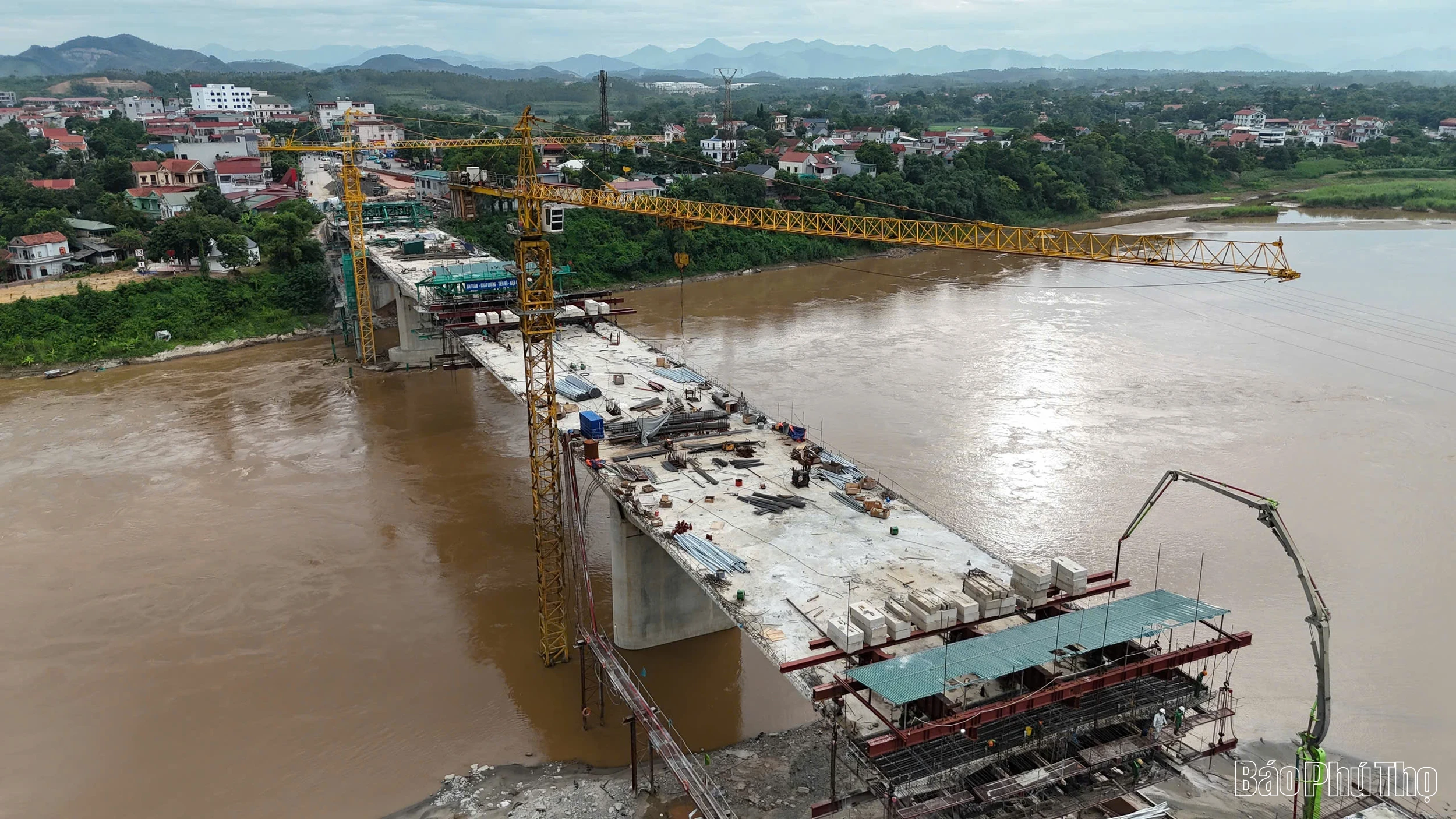 Bustling Scene at New Phong Chau Bridge Construction Site