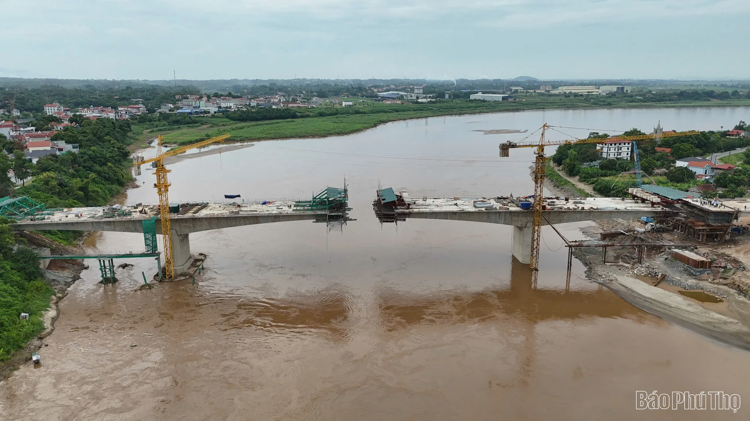 Bustling Scene at New Phong Chau Bridge Construction Site